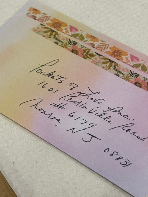 Handwritten note with floral washi tape — Painted Pockets craft session